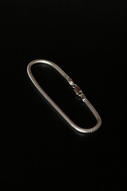 Men's silver snake chain bracelet.